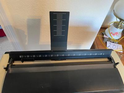 OLYMPIA TYPEWRITER AND TYPEWRITER TABLE