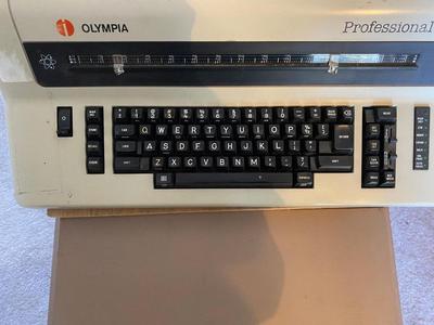 OLYMPIA TYPEWRITER AND TYPEWRITER TABLE