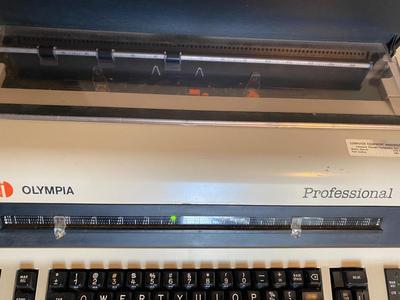OLYMPIA TYPEWRITER AND TYPEWRITER TABLE