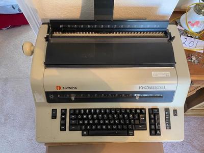 OLYMPIA TYPEWRITER AND TYPEWRITER TABLE