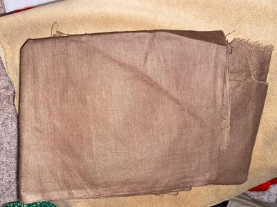 SEVERAL YARDS OF MATERIAL & CUT FOR QUILTING AND OTHER LARGE PIECES OF MATERIAL
