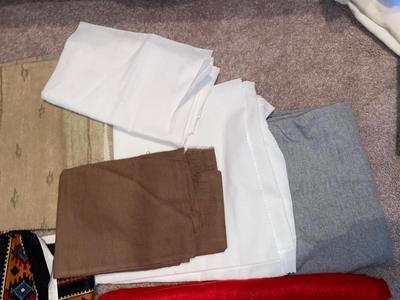 SEVERAL YARDS OF MATERIAL & CUT FOR QUILTING AND OTHER LARGE PIECES OF MATERIAL