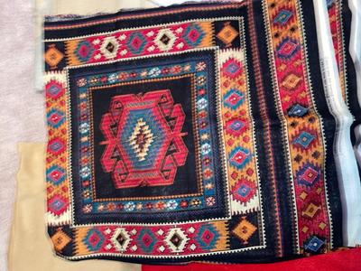 SEVERAL YARDS OF MATERIAL & CUT FOR QUILTING AND OTHER LARGE PIECES OF MATERIAL