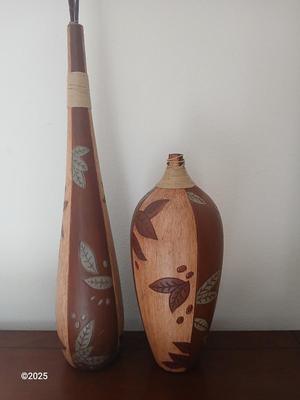 Two tall ceramic decorative vases