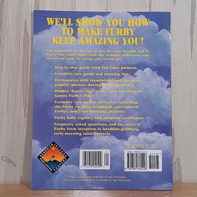 LOT 22: Vintage Tiger Furby's 1999 Striped, 1998 Giraffe and 1999 Furby Baby w/ Furby Trainer's Guide Book