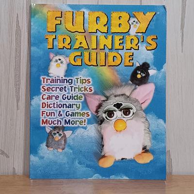 LOT 22: Vintage Tiger Furby's 1999 Striped, 1998 Giraffe and 1999 Furby Baby w/ Furby Trainer's Guide Book