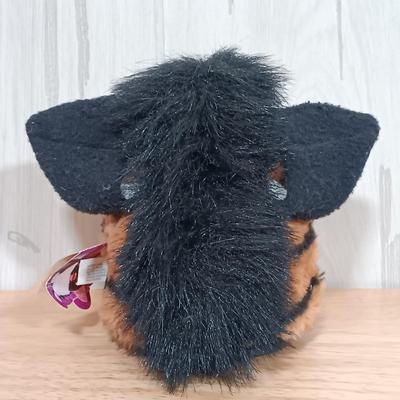 LOT 22: Vintage Tiger Furby's 1999 Striped, 1998 Giraffe and 1999 Furby Baby w/ Furby Trainer's Guide Book