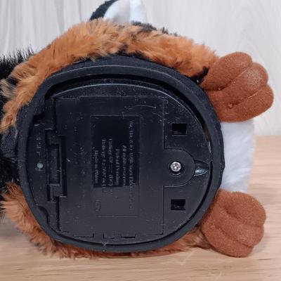 LOT 22: Vintage Tiger Furby's 1999 Striped, 1998 Giraffe and 1999 Furby Baby w/ Furby Trainer's Guide Book