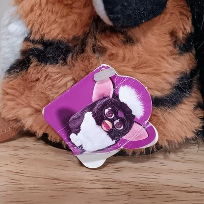 LOT 22: Vintage Tiger Furby's 1999 Striped, 1998 Giraffe and 1999 Furby Baby w/ Furby Trainer's Guide Book