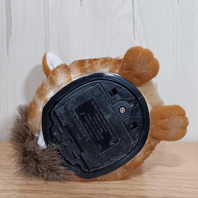 LOT 22: Vintage Tiger Furby's 1999 Striped, 1998 Giraffe and 1999 Furby Baby w/ Furby Trainer's Guide Book