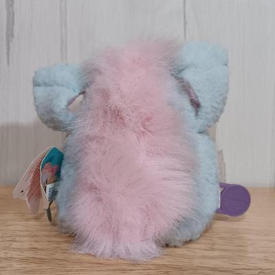 LOT 22: Vintage Tiger Furby's 1999 Striped, 1998 Giraffe and 1999 Furby Baby w/ Furby Trainer's Guide Book