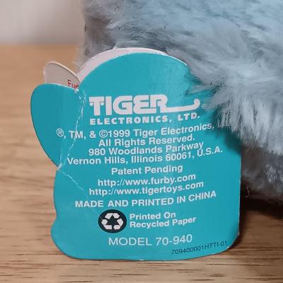 LOT 22: Vintage Tiger Furby's 1999 Striped, 1998 Giraffe and 1999 Furby Baby w/ Furby Trainer's Guide Book