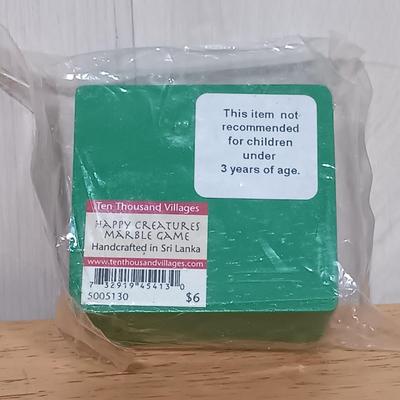 LOT 27: West German Rolly-Togs Roly Poly Clown, Carousel Music Box with Trinkets, Metal Drum & Marble Game