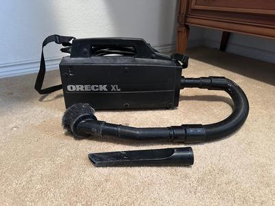 ORECK VACUUM WITH SHOULDER STRAP, EXTRA BAGS, WASTE BASKET