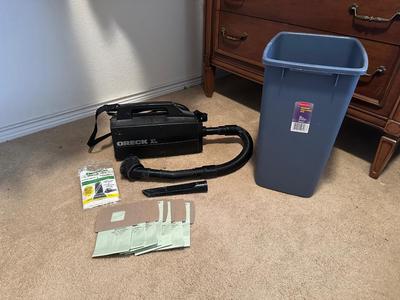 ORECK VACUUM WITH SHOULDER STRAP, EXTRA BAGS, WASTE BASKET