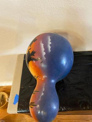 PAINTED GOURD AND MOUNTED HORNS