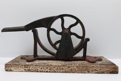 Mechanical Cast Iron Cork Press Tool Mounted on Wooden Plank
