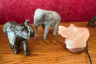 Elephants, lighted pink quartz and green glass elephant