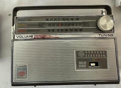 Home goods, Vintage GE Solid State hand held radio