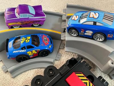 Racing track and larger Cars