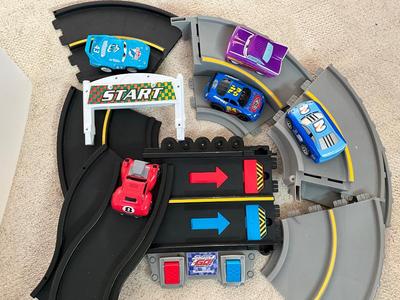 Racing track and larger Cars