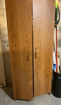 Tall cabinet with contents shown