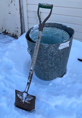 Metal tins and shovel