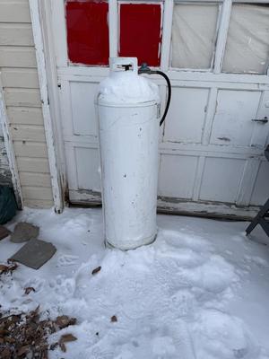 Propane tank with attachment