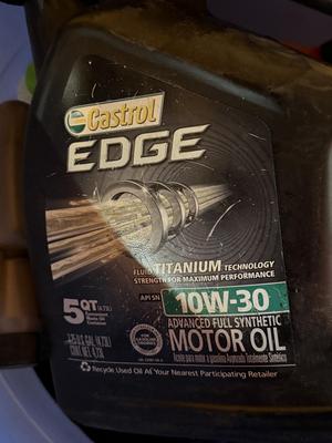 Blue round container of Motor Oils