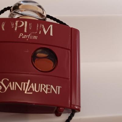 LOT 275: Vintage Yvs St Laurent Opium Perfume with Nina Ricci L'air Du Temps Empty Bottles, Trueste by Tiffany Bottle, Nueva Maja...