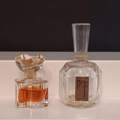 LOT 275: Vintage Yvs St Laurent Opium Perfume with Nina Ricci L'air Du Temps Empty Bottles, Trueste by Tiffany Bottle, Nueva Maja...