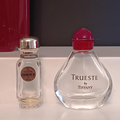 LOT 275: Vintage Yvs St Laurent Opium Perfume with Nina Ricci L'air Du Temps Empty Bottles, Trueste by Tiffany Bottle, Nueva Maja...