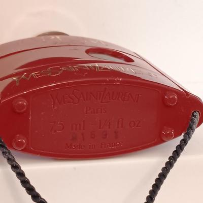 LOT 275: Vintage Yvs St Laurent Opium Perfume with Nina Ricci L'air Du Temps Empty Bottles, Trueste by Tiffany Bottle, Nueva Maja...