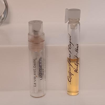 LOT 275: Vintage Yvs St Laurent Opium Perfume with Nina Ricci L'air Du Temps Empty Bottles, Trueste by Tiffany Bottle, Nueva Maja...