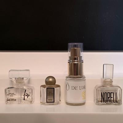 LOT 276: Fenton Milk Glass Boot, Anais Anais R. Royale Paris Vintage Ceramic Bottle, Jardine de Bagatelle 4 fl oz Bottle & More