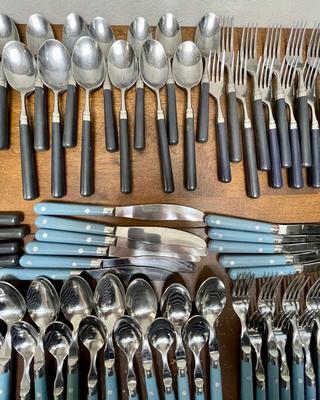 2 flatware sets = sky blue VF Mardi Gras and Black Stanley Roberts - a few missing pieces