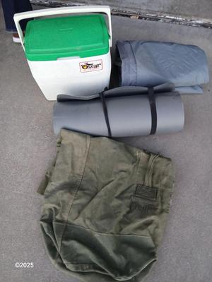 Small cooler - Marines laundry sack - Air mattress with pump and a foam bedroll