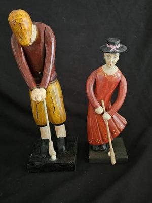 Vintage handcrafted wood golf sculptures