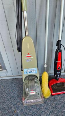 Bissell carpet cleaner - small Haan vacuum and a duster brush