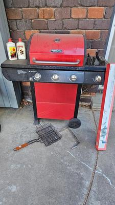 BBQ-Pro Outdoor grill with rotisserie and other cooking utensils