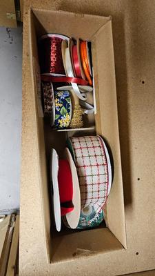A bunch of Holiday ribbon and wrapping paper and ribbon