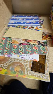 A bunch of Holiday ribbon and wrapping paper and ribbon