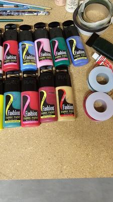 Fabric paint and Arcrylic paint with brushes and other crafting items