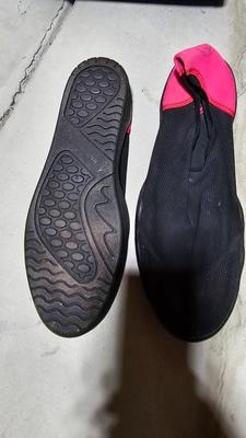 Folding beach rug, water floaties, and water shoes