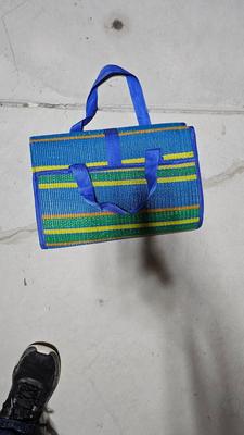 Folding beach rug, water floaties, and water shoes