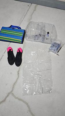 Folding beach rug, water floaties, and water shoes