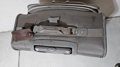 Luggage / Suitcases and two duffel bags