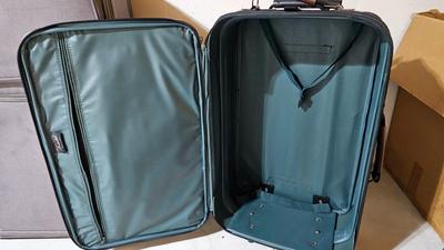 Luggage / Suitcases and two duffel bags