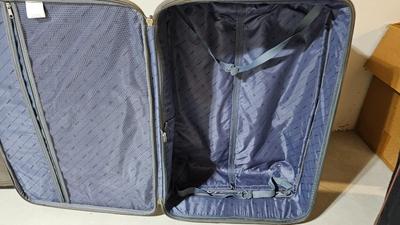 Luggage / Suitcases and two duffel bags