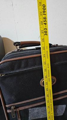 Luggage / Suitcases and two duffel bags